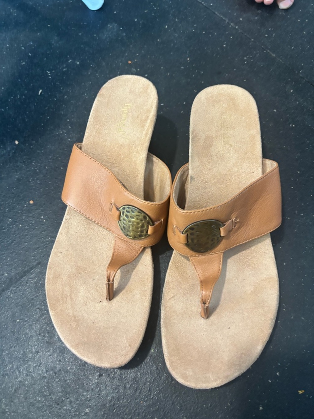 Tan Leather Thong Sandals with Decorative Medallion
